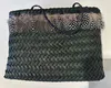 Handwoven dyed Harakeke traditional Maori Kete with feathers by New Zealand artist Bernie Ross, available at The Little Gallery Whangamata